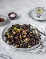 Crispy Brussels Sprouts With Fried Shallots, Bacon, & Dijon Vinaigrette