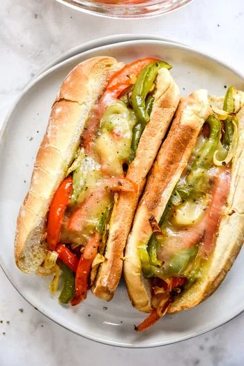 Air-Fryer Sausage Dogs with Peppers and Onions