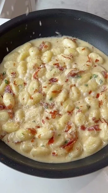 Truffle Cream Gnocchi with Crispy Prosciutto & Roasted Garlic