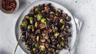 Crispy Brussels Sprouts With Fried Shallots, Bacon, & Dijon Vinaigrette